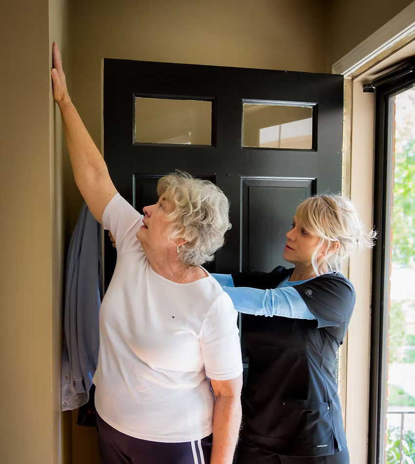 A therapist and client reviewing a wellness plan together